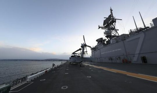 The amphibious assault ship USS Tripoli (LHA 7) anchors off the coast of Punta Arenas, Chile, Aug 29, 2020. Tripoli was commissioned administratively July 15, 2020. U.S. NAVY / Mass Communications Specialist 1st Class Michael H. Lee